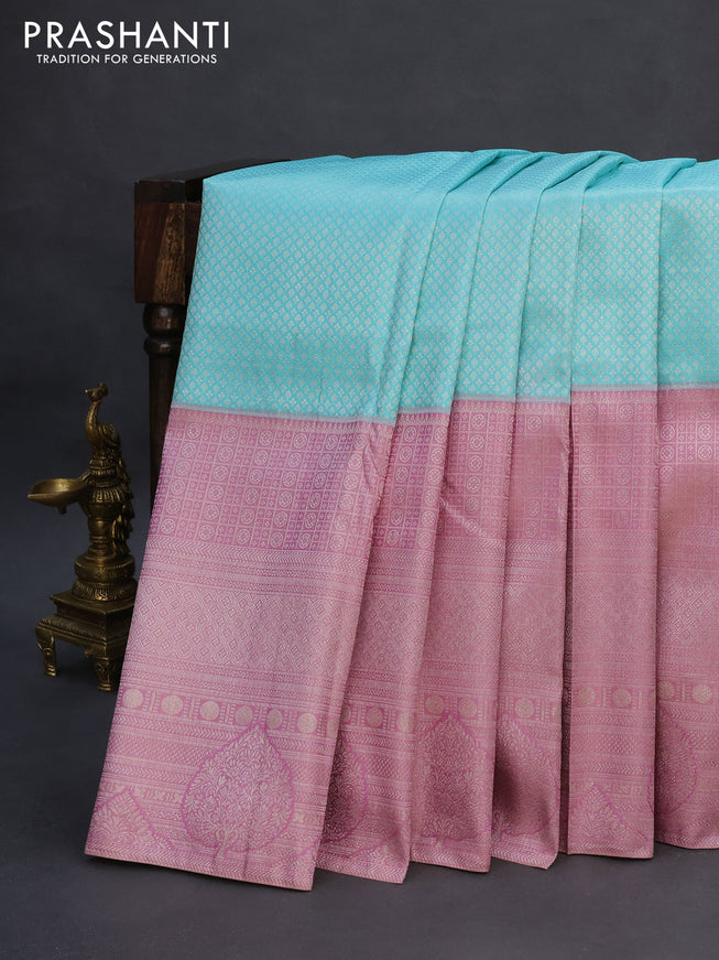 Pure kanchipuram silk saree light blue and pastel pink with allover silver zari woven brocade weaves and long silver zari woven border