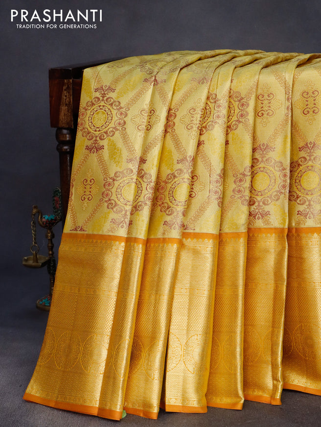 Pure kanchipuram tissue silk saree gold and sandal with allover zari woven brocade weaves and long zari woven border