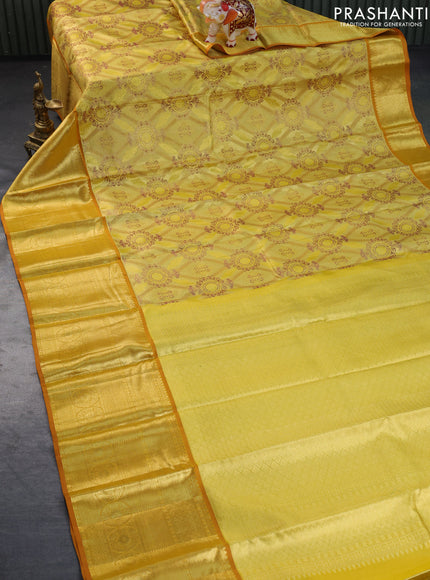 Pure kanchipuram tissue silk saree gold and sandal with allover zari woven brocade weaves and long zari woven border