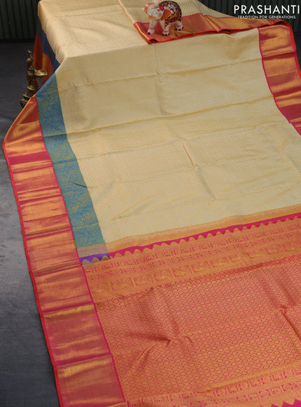 Pure kanchipuram silk saree sandal and dual shade of pinkish orange with allover zari woven butta weaves and long zari woven border