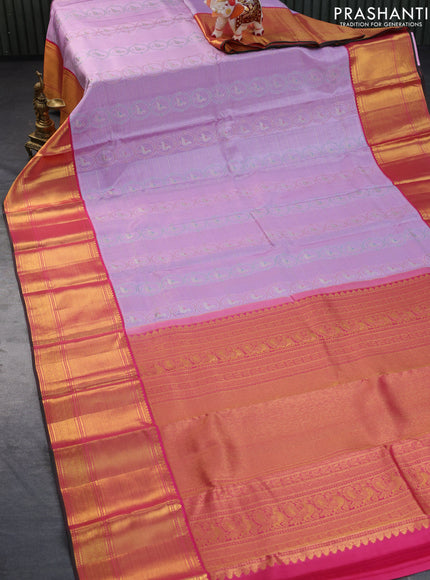 Pure kanchipuram silk saree lavender shade and pink with allover silver zari woven brocade weaves and long zari woven border