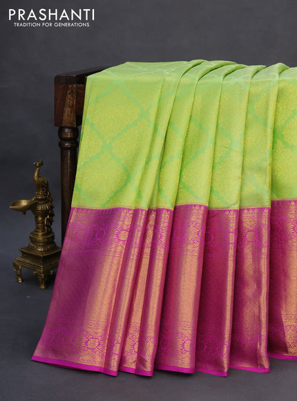 Pure kanchipuram silk saree light green and purple with allover zari woven brocade weaves and long zari woven border