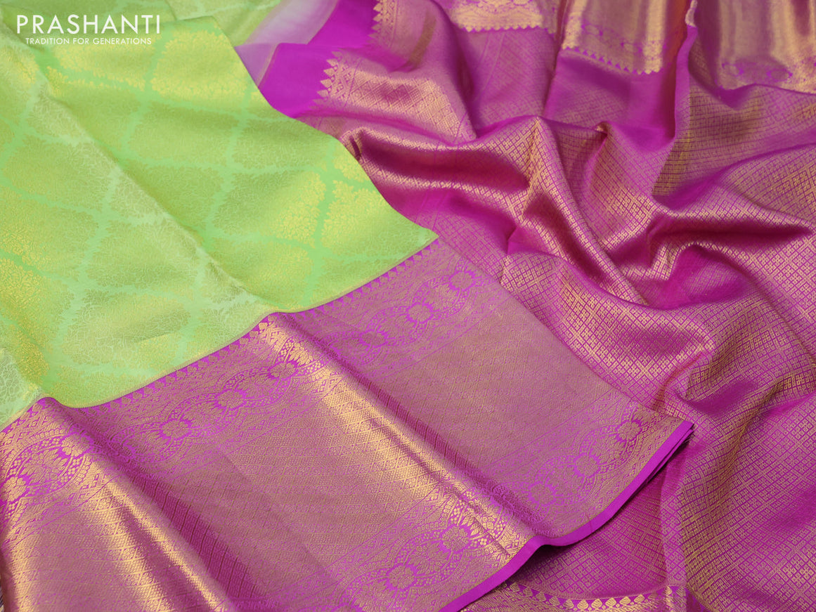 Pure kanchipuram silk saree light green and purple with allover zari woven brocade weaves and long zari woven border