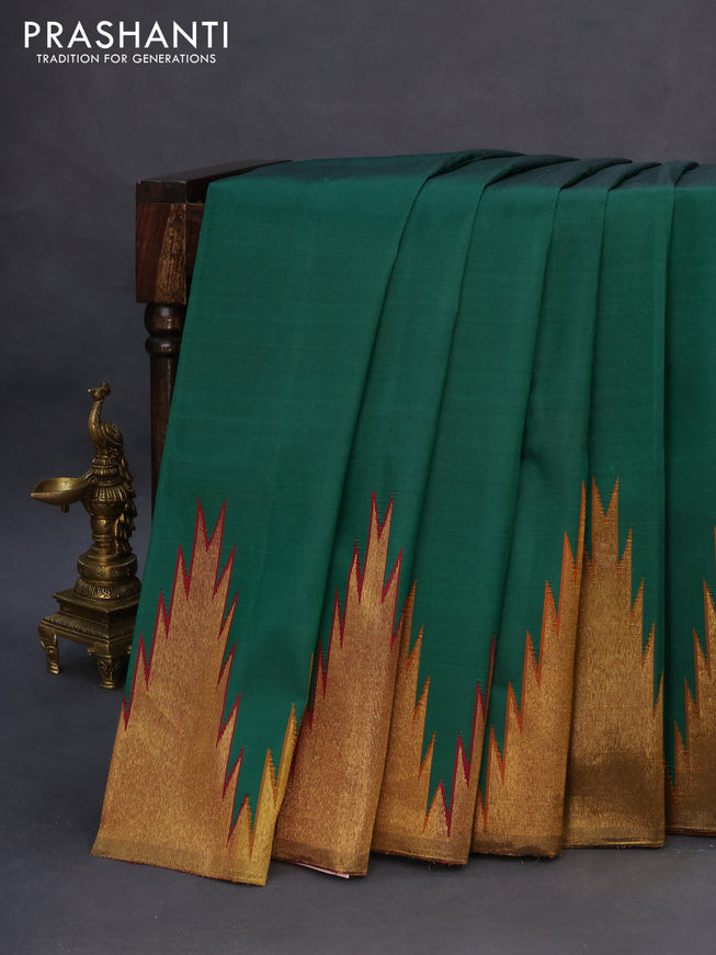 Pure kanchipuram silk saree green with plain body and temple design zari woven border