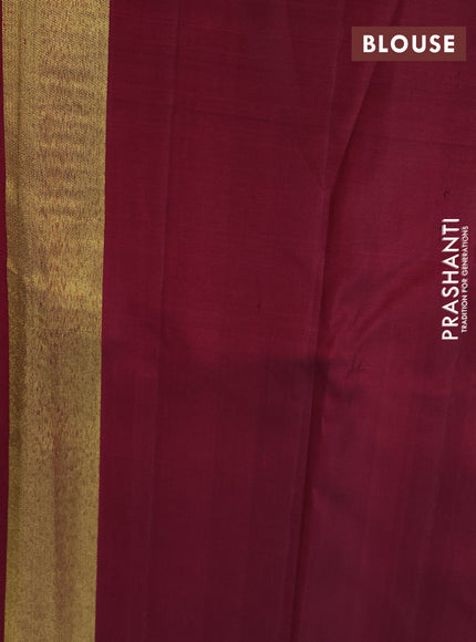 Pure kanchipuram silk saree green with plain body and temple design zari woven border