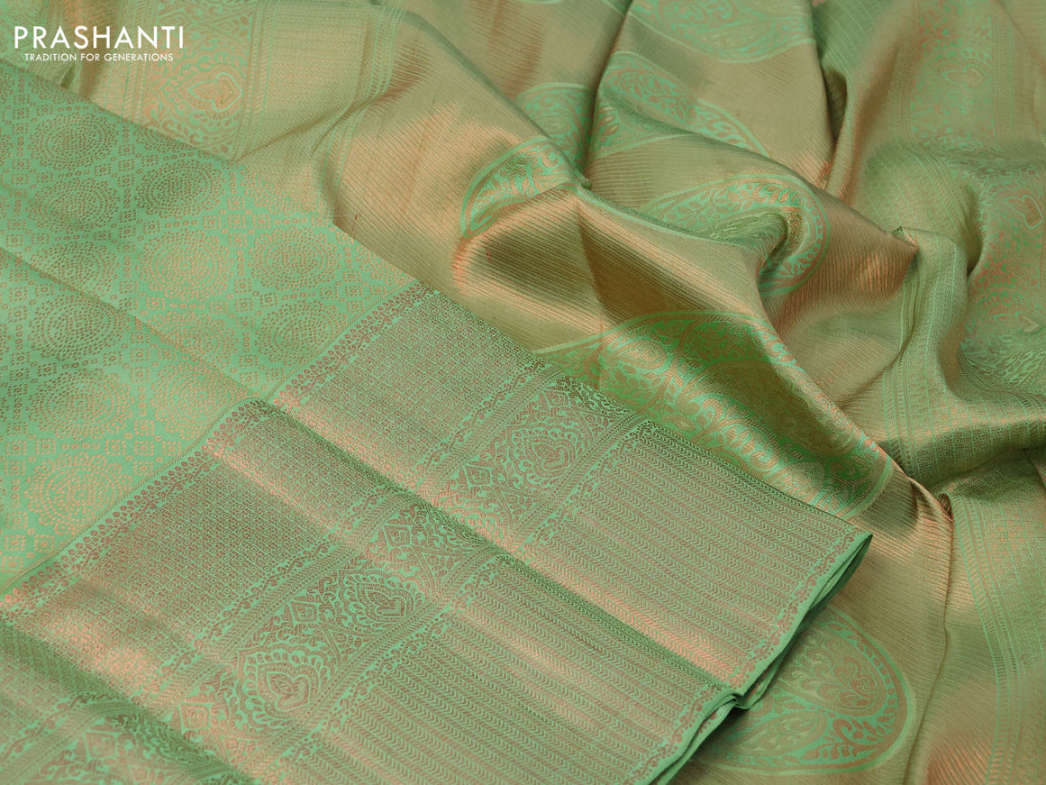 Pure kanchipuram silk saree pastel green with allover copper zari woven brocade weaves and long copper zari woven border