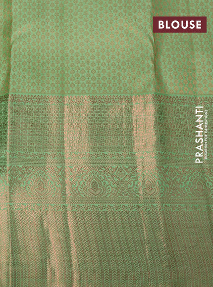 Pure kanchipuram silk saree pastel green with allover copper zari woven brocade weaves and long copper zari woven border