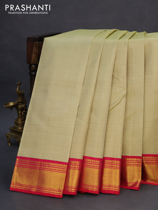 Pure kanchipuram silk saree sandal and pink with plain body and zari woven korvai border