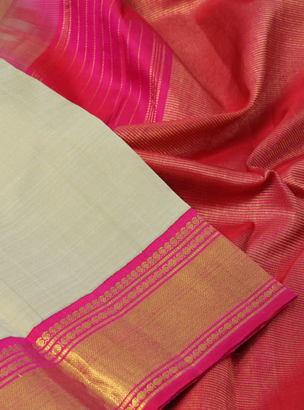 Pure kanchipuram silk saree sandal and pink with plain body and zari woven korvai border