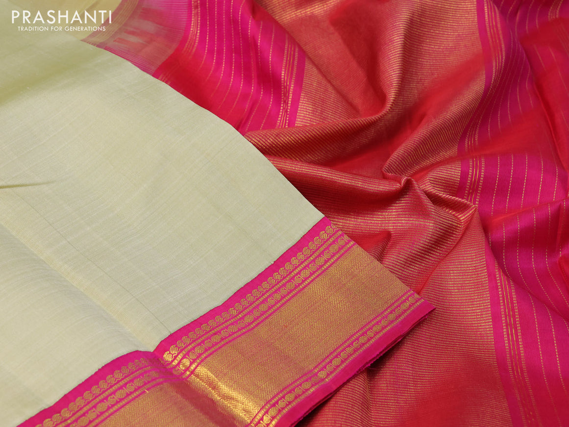 Pure kanchipuram silk saree sandal and pink with plain body and zari woven korvai border