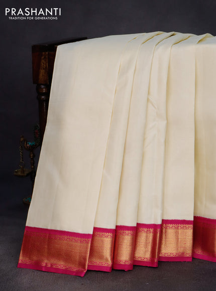 Pure kanchipuram silk saree cream and pink with plain body and zari woven korvai border