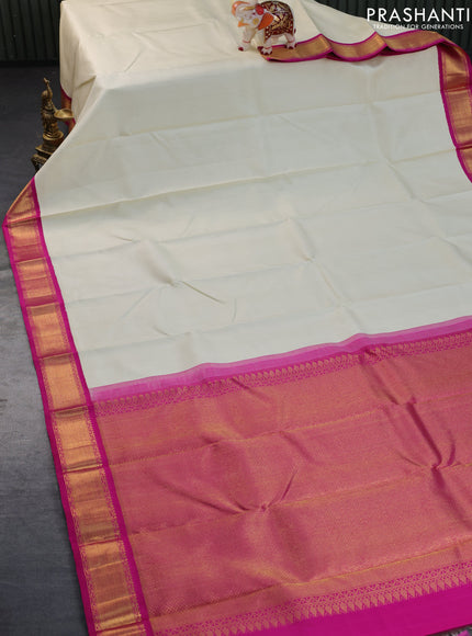 Pure kanchipuram silk saree cream and pink with plain body and zari woven korvai border