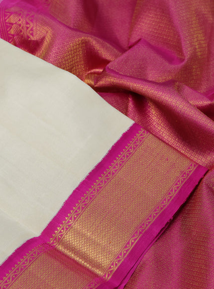 Pure kanchipuram silk saree cream and pink with plain body and zari woven korvai border