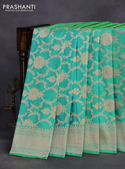 Pure banarasi uppada silk saree dual shade of teal bluish green with allover zari woven brocade weaves and zari woven border