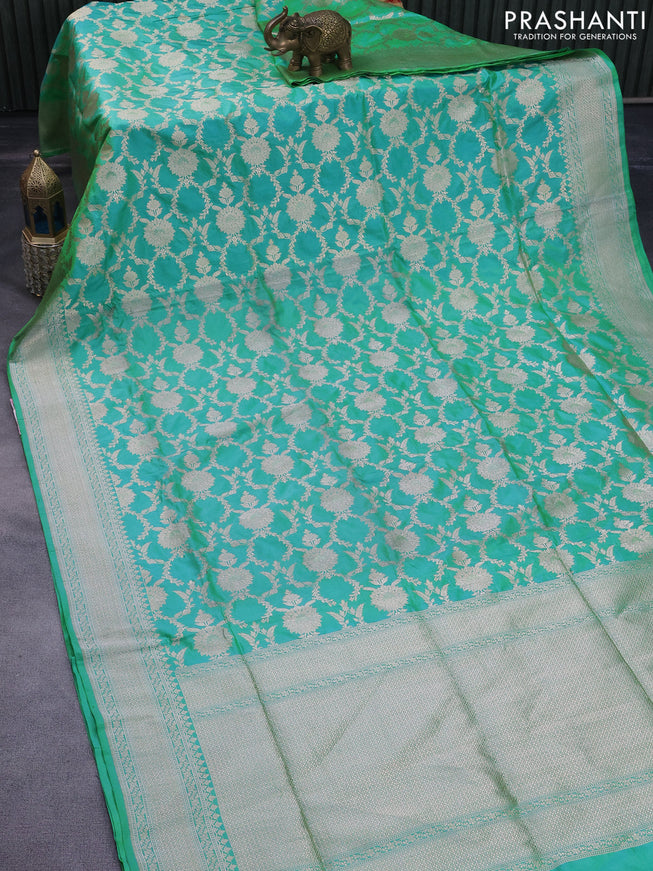 Pure banarasi uppada silk saree dual shade of teal bluish green with allover zari woven brocade weaves and zari woven border