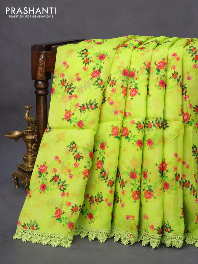 Organza silk saree lime green with allover floral prints and crocia lace border