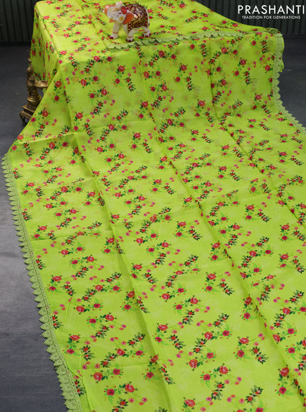 Organza silk saree lime green with allover floral prints and crocia lace border