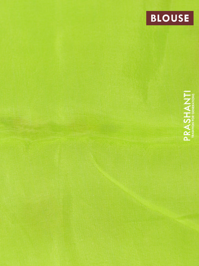 Organza silk saree lime green with allover floral prints and crocia lace border