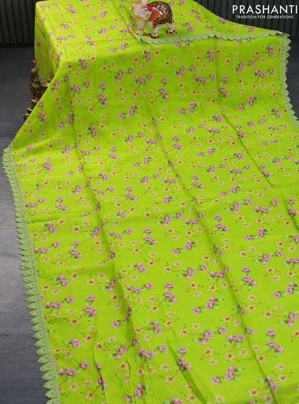 Organza silk saree fluorescent green with allover floral prints and crocia lace border