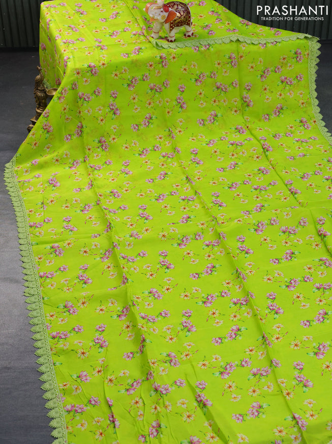 Organza silk saree fluorescent green with allover floral prints and crocia lace border