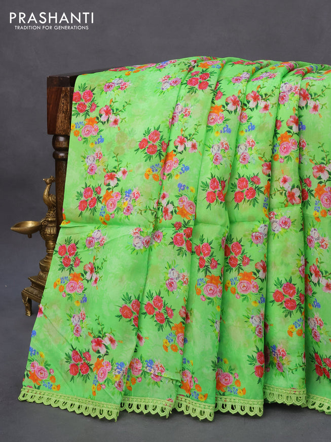 Organza silk saree green with allover floral prints and crocia lace border