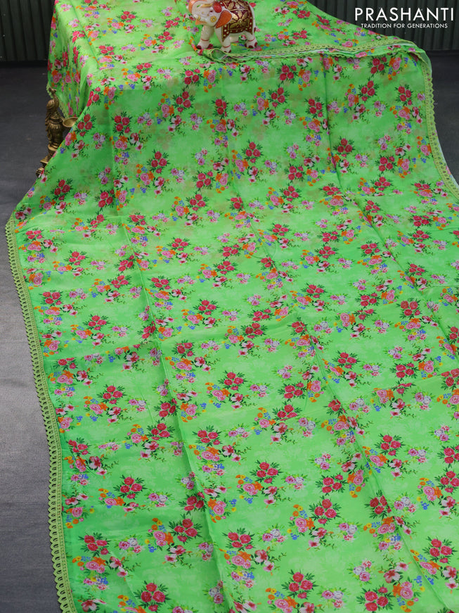 Organza silk saree green with allover floral prints and crocia lace border