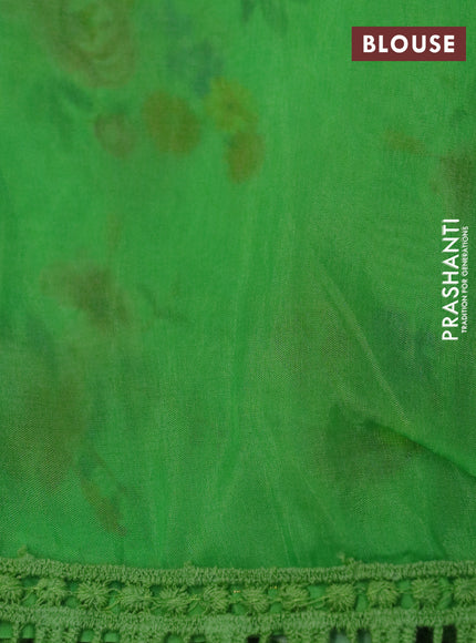 Organza silk saree green with allover floral prints and crocia lace border