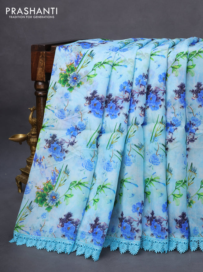 Organza silk saree light blue with allover floral prints and crocia lace border