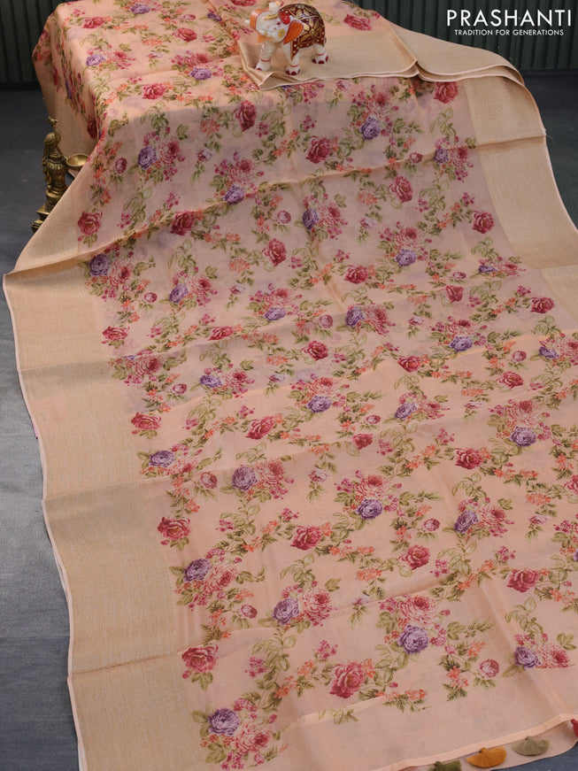 Organza silk saree peach orange with allover floral prints and woven border