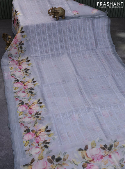 Pure organza partly silk saree grey with allover thread weaves and floral printed embroidery work border