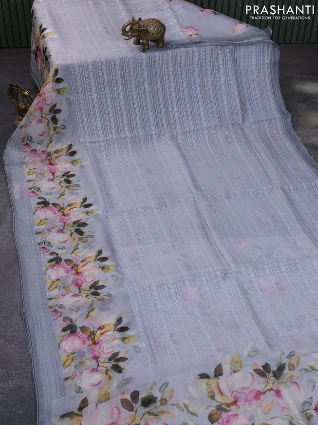 Pure organza partly silk saree grey with allover thread weaves and floral printed embroidery work border