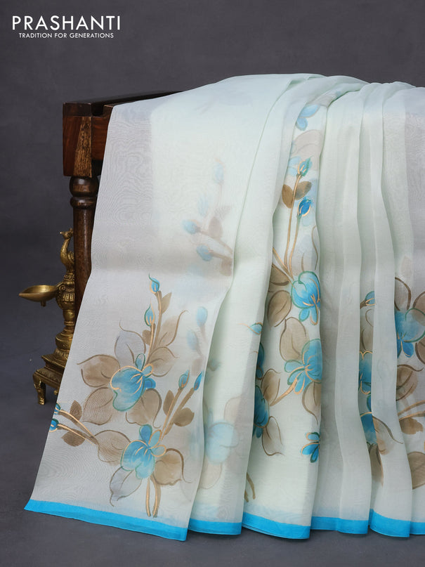 Pure organza silk saree pastel blue and light blue with floral digital butta prints and piping border