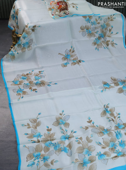 Pure organza silk saree pastel blue and light blue with floral digital butta prints and piping border