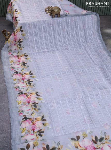 Pure organza partly silk saree grey with embroidery work buttas and floral printed embroidery work border