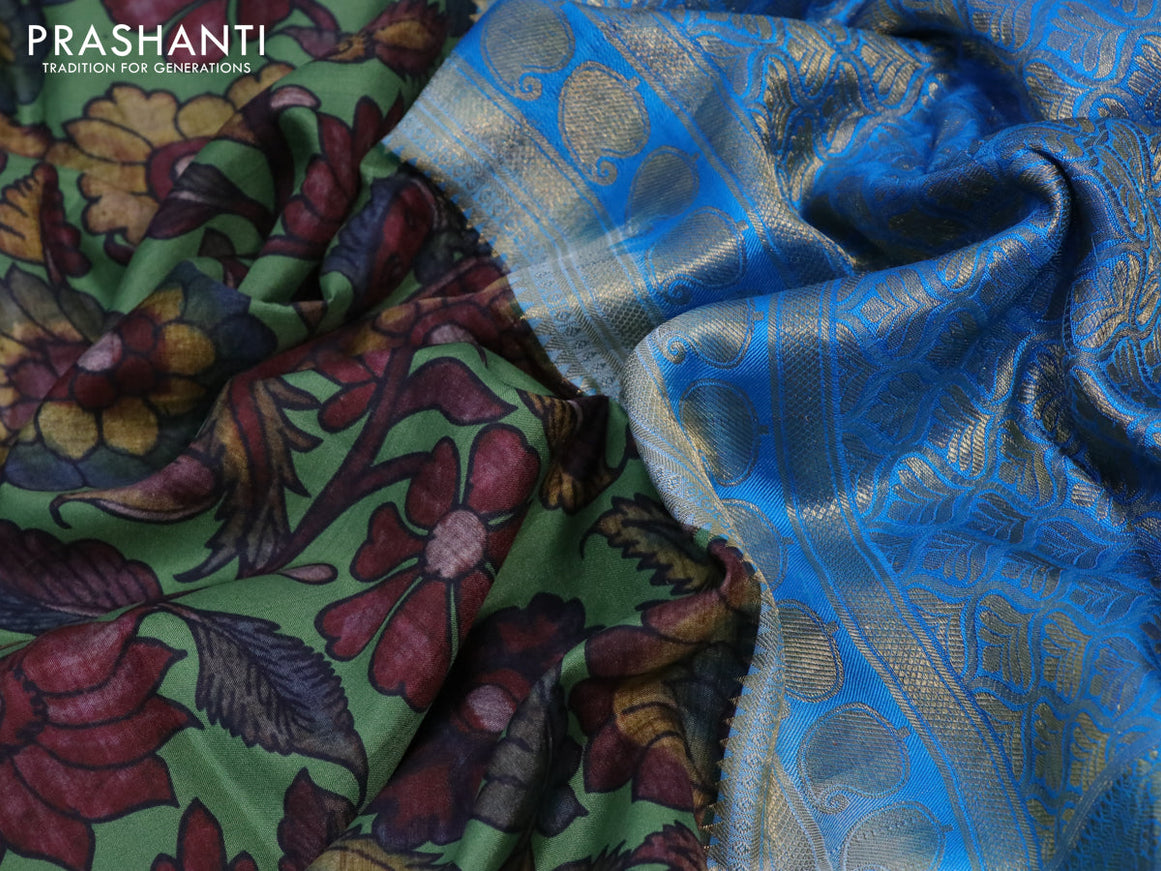 Pure kanchipuram silk saree green shade and cs blue with allover kalamkari digital prints and long zari woven border