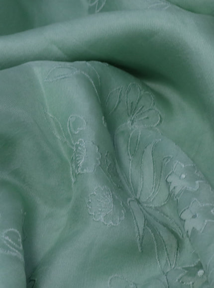 Pure organza silk saree pastel green with floral design embroidery work weaves and embroidery work simple border