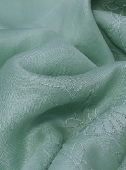 Pure organza silk saree pastel green with floral design embroidery work weaves and embroidery work simple border