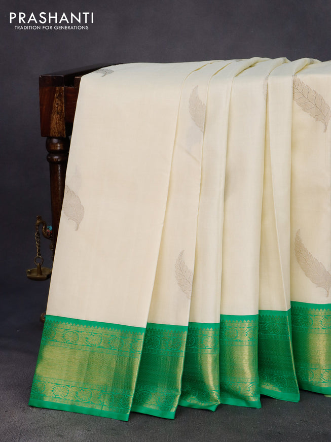 Pure kanchipuram silk saree off white and green with zari woven leaf buttas and zari woven border