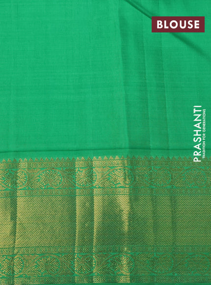 Pure kanchipuram silk saree off white and green with zari woven leaf buttas and zari woven border