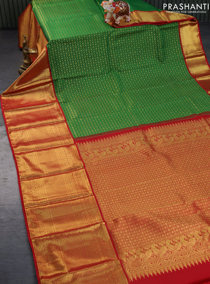 Pure kanchipuram silk saree green and red with allover zari woven brocade weaves and long zari woven border