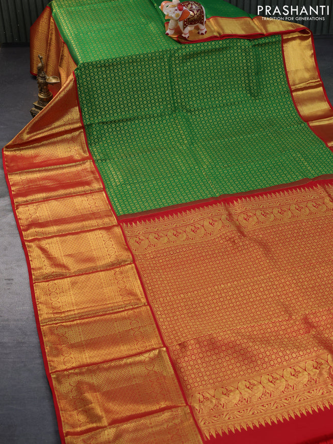 Pure kanchipuram silk saree green and red with allover zari woven brocade weaves and long zari woven border