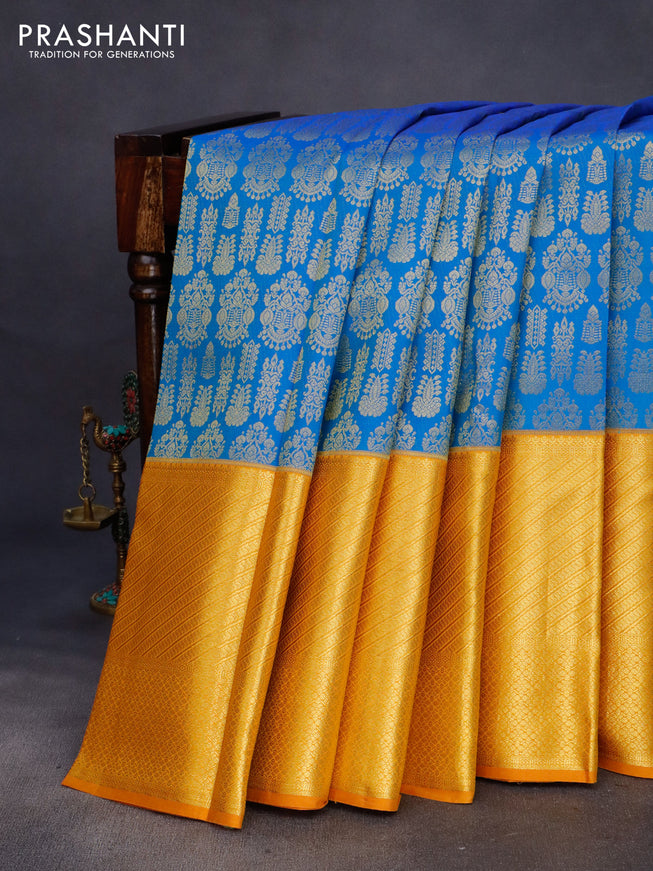 Pure kanchipuram silk saree cs blue and mustard yellow with allover zari woven brocade weaves and long zari woven border