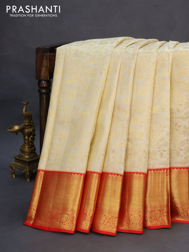 Pure kanchipuram silk saree cream and red with allover zari woven brocade weaves and zari woven border