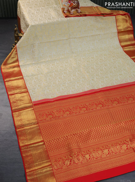 Pure kanchipuram silk saree cream and red with allover zari woven brocade weaves and zari woven border