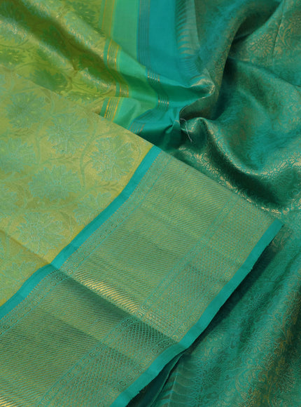 Pure kanchipuram tissue silk saree light green and teal blue with allover zari woven brocade weaves and zari woven border