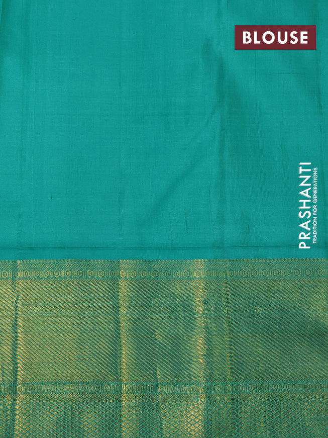 Pure kanchipuram tissue silk saree light green and teal blue with allover zari woven brocade weaves and zari woven border