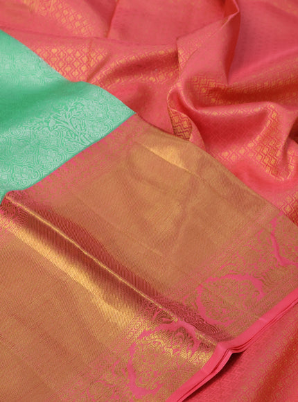 Pure kanchipuram silk saree teal green shade and pink with allover silver zari woven brocade weaves and long zari woven border