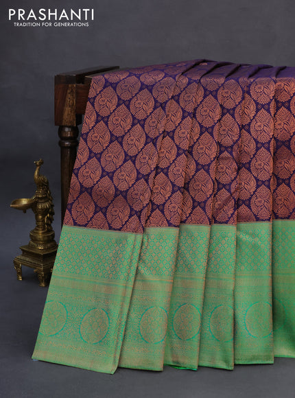 Pure kanchipuram silk saree dark blue and green with copper zari woven brocade weaves and long zari woven border