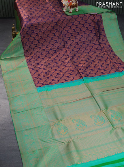 Pure kanchipuram silk saree dark blue and green with copper zari woven brocade weaves and long zari woven border