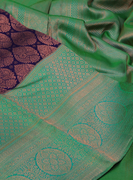 Pure kanchipuram silk saree dark blue and green with copper zari woven brocade weaves and long zari woven border